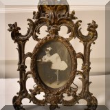 D30. Antique brass picture frame. 12.5&rdquo;h 